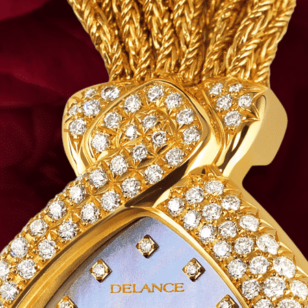 Schmuckuhr für besondere Frauen: Diva blue: Golduhr mit 141 Diamanten, Zifferblatt Perlmutter blau mit 12 Diamanten, vergoldete Hände, Goldcabochon mit une spinelle rose, Goldarmband Cascade