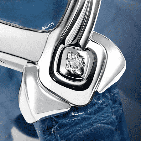 Original womens watch - Dolphin: Steel watch, blue mother-of-pearl dial, nickel-plated hands, steel cabochon with a diamond, blue alligator strap, engraved with a dolphin and set with a sapphire at 10 o'glock