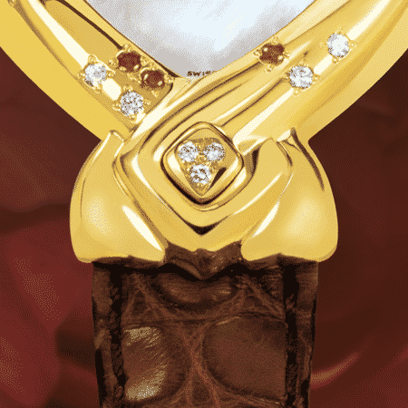 best watches for mom - My mother's watch: Gold watch set with 13 rubies and 4 sapphires, special pink luz dial, gold-plated hands, gold cabochon with a ruby, pink alligator strap