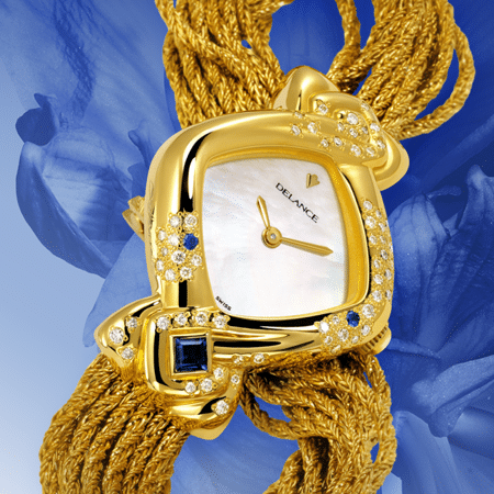 "Sa montre DELANCE ""Aïda"" lui ressemble, lui parle d’elle et de ses amours. Elle est le miroir de son âme. Chaque élément a été choisi avec art et raffinement et signifie quelque chose d’important.