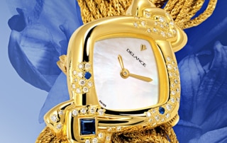 "Sa montre DELANCE ""Aïda"" lui ressemble, lui parle d’elle et de ses amours. Elle est le miroir de son âme. Chaque élément a été choisi avec art et raffinement et signifie quelque chose d’important.